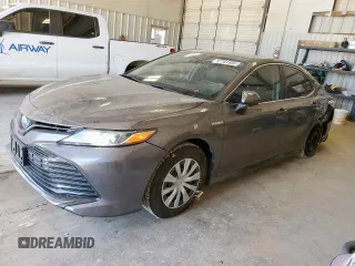 2019 Toyota Camry Hybrid LE z VIN 4T1B31HKXKU516305, wystawiony jako Copart lot #57161605 z przebiegiem 54 823 mil mil oraz Szkoda całkowita • Salvage title. Historia ofert i sprzedaży dostępna na DreamBid. Obrazek 1.