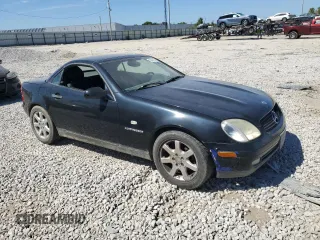 1999 Mercedes-Benz SLK-Class with VIN WDBKK47F8XF124253, listed as a Copart auction lot 70414014 with 0 mi miles and Salvage Title. Bid and sale history available at carsss.com. Image 4.