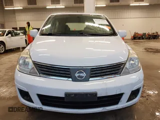 2009 Nissan Versa 1.8 S with VIN 3N1BC13E69L386083, listed as a IAAI auction lot 41717999 with 99,511 mi miles. Bid and sale history available at carsss.com. Image 13.