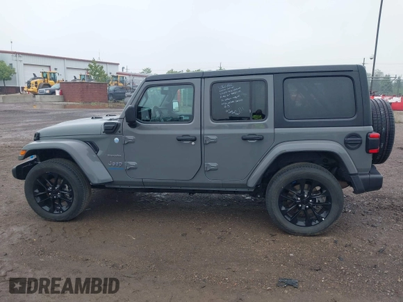 2023 Jeep Wrangler Sahara with VIN 1C4JJXP6XPW698886, listed as a IAAI auction lot 42439690 with 41,787 mi miles and . Bid and sale history available at DreamBid. Image 14.