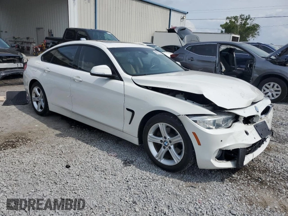 2015 BMW 4 Series 428i with VIN WBA4A9C59FGL85999, listed as a Copart auction lot 56275455 with 105,961 mi miles and Salvage title. Bid and sale history available at DreamBid. Image 4.