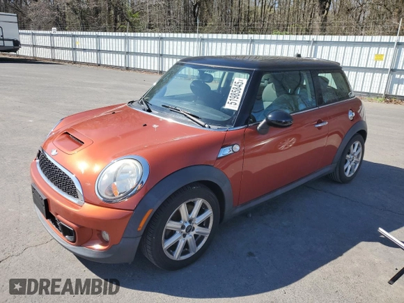 2011 MINI Hardtop S with VIN WMWSV3C57BTY11831, listed as a Copart auction lot 51985845 with 70,690 mi miles and Salvage Title. Bid and sale history available at DreamBid. Image 1.