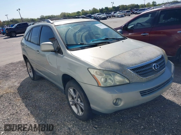 2007 Lexus RX 400h z VIN JTJGW31U272002926, wystawiony jako IAAI lot #41792083 z przebiegiem 227 063 mil mil oraz . Historia ofert i sprzedaży dostępna na DreamBid. Obrazek 1.