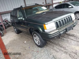 1997 Jeep Grand Cherokee Limited with VIN 1J4GZ78Y5VC723429, listed as a IAAI auction lot 42012836 with 231,126 mi miles. Bid and sale history available at carsss.com. Image 1.
