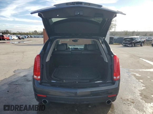 2014 Cadillac SRX Luxury Collection with VIN 3GYFNBE31ES561151, listed as a Copart auction lot 42499575 with 140,677 mi miles and Salvage Title. Bid and sale history available at carsss.com. Image 6.