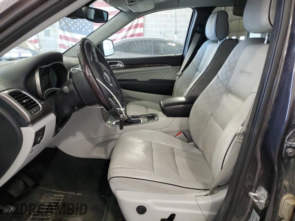 2017 Jeep Grand Cherokee Summit with VIN 1C4RJFJT4HC723876, listed as a Copart auction lot 52647205 with 97,412 mi miles and Salvage title. Bid and sale history available at DreamBid. Image 7.