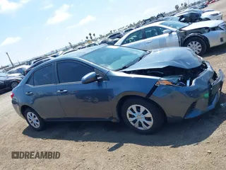2016 Toyota Corolla L with VIN 5YFBURHE4GP427800, listed as a IAAI auction lot 42182439 with 99,529 mi miles and . Bid and sale history available at DreamBid. Image 13.