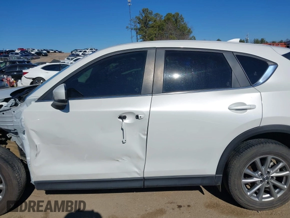 2023 Mazda CX-5 2.5 S Preferred Package with VIN JM3KFBCM6P0140427, listed as a IAAI auction lot 41335811 with 42,713 mi miles. Bid and sale history available at carsss.com. Image 15.