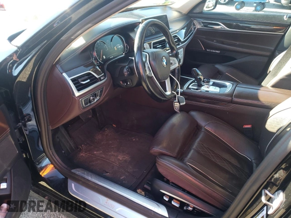 2017 BMW 7 Series 740i xDrive with VIN WBA7E4C58HGU99127, listed as a Copart auction lot 70320002 with 62,489 mi miles. Bid and sale history available at carsss.com. Image 7.