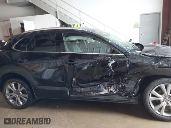 2023 Mazda CX-30 S Premium z VIN 3MVDMBDM5PM589289, wystawiony jako IAAI lot #41331253 z przebiegiem 24 804 mil mil oraz . Historia ofert i sprzedaży dostępna na DreamBid. Obrazek 13.