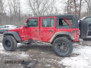 2018 Jeep Wrangler Unlimited Sport S with VIN 1C4HJXDG5JW131522, listed as a IAAI auction lot 41563099 with 75,405 mi miles and . Bid and sale history available at DreamBid. Image 13.