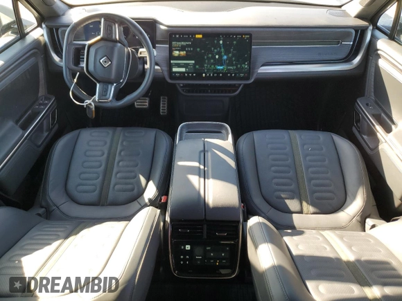 2023 Rivian R1T Adventure with VIN 7FCTGAAA3PN020577, listed as a Copart auction lot 84847414 with 7,888 mi miles and Salvage Title. Bid and sale history available at carsss.com. Image 8.