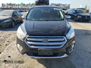2017 Ford Escape SE with VIN 1FMCU9G98HUD29930, listed as a Copart auction lot 48168735 with 143,891 mi miles and Salvage Title. Bid and sale history available at carsss.com. Image 5.