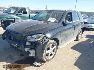2016 Mercedes-Benz GLE with VIN 4JGDA5HB0GA777960, listed as a IAAI auction lot 41406957 with 137,026 mi miles. Bid and sale history available at carsss.com. Image 2.