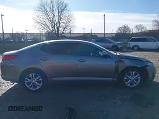 2012 Kia Optima EX with VIN 5XXGN4A62CG038200, listed as a IAAI auction lot 41868714 with 219,156 mi miles and . Bid and sale history available at carsss.com. Image 12.