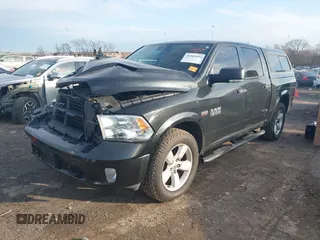 2015 Ram 1500 Outdoorsman z VIN 1C6RR7LT8FS653031, wystawiony jako IAAI lot #41581094 z przebiegiem 129 178 mil mil oraz . Historia ofert i sprzedaży dostępna na DreamBid. Obrazek 2.