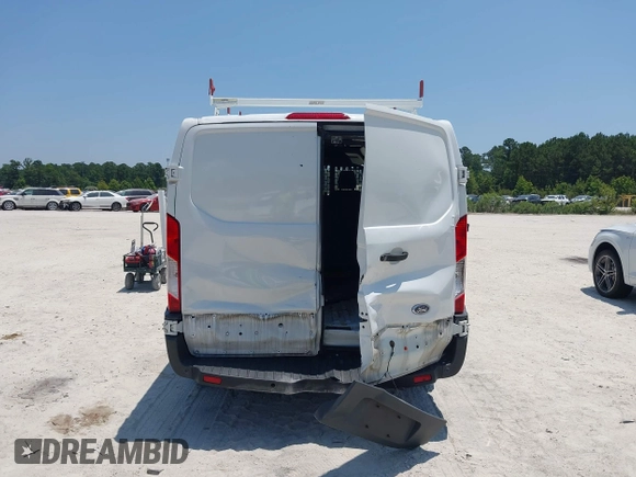 2015 Ford Transit Cargo z VIN 1FTNE1YM9FKA16926, wystawiony jako IAAI lot #42493994 z przebiegiem 218 427 mil mil oraz . Historia ofert i sprzedaży dostępna na DreamBid. Obrazek 16.