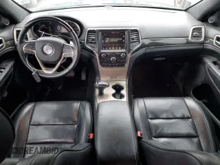 2015 Jeep Grand Cherokee Overland with VIN 1C4RJFCT2FC762573, listed as a Copart auction lot 59123275 with 229,128 mi miles and Salvage title. Bid and sale history available at DreamBid. Image 8.