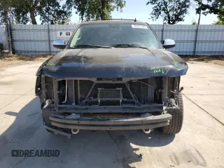 2014 Chevrolet Tahoe LT with VIN 1GNSCBE07ER115998, listed as a Copart auction lot 59577485 with 154,486 mi miles and Salvage title. Bid and sale history available at DreamBid. Image 5.