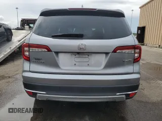 2019 Honda Pilot Touring 8-Passenger z VIN 5FNYF5H91KB033661, wystawiony jako Copart lot #56650155 z przebiegiem 73 512 mil mil oraz Szkoda całkowita • Salvage title. Historia ofert i sprzedaży dostępna na DreamBid. Obrazek 6.