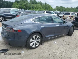 2020 Tesla Model S Long Range с VIN 5YJSA1E28LF390602, выставлен на аукционе Copart как лот 63778115 с пробегом 39 802 миль миль и Списание • Salvage title. История ставок и продаж доступна на DreamBid. Изображение 3.