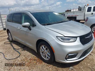 2023 Chrysler Pacifica Touring L with VIN 2C4RC1BG7PR521232, listed as a IAAI auction lot 42087909 with 34,609 mi miles and . Bid and sale history available at DreamBid. Image 1.