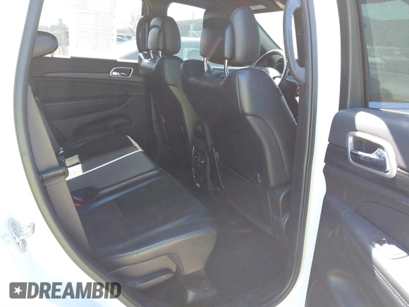 2021 Jeep Grand Cherokee Laredo E with VIN 1C4RJFAG5MC579865, listed as a IAAI auction lot 41818874 with 105,489 mi miles and . Bid and sale history available at DreamBid. Image 8.