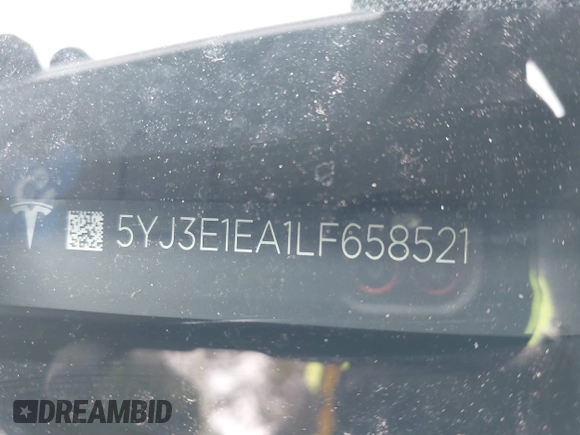 2020 Tesla Model 3 Standard Range Plus with VIN 5YJ3E1EA1LF658521, listed as a IAAI auction lot 41804722 with 83,248 mi miles and . Bid and sale history available at DreamBid. Image 19.