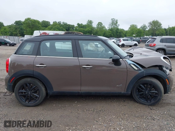 2014 MINI Countryman S with VIN WMWZC5C55EWP41717, listed as a IAAI auction lot 42324347 with Not provided miles and . Bid and sale history available at DreamBid. Image 14.