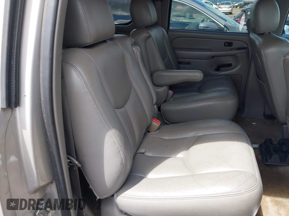 2004 Chevrolet Suburban Z71 z VIN 3GNFK16Z94G210623, wystawiony jako IAAI lot #42227673 z przebiegiem 183 831 mil mil oraz . Historia ofert i sprzedaży dostępna na DreamBid. Obrazek 8.