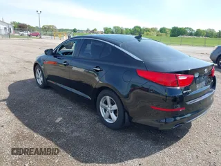 2014 Kia Optima LX with VIN 5XXGM4A76EG346193, listed as a IAAI auction lot 42176760 with 124,702 mi miles and . Bid and sale history available at DreamBid. Image 3.