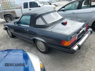 1987 Mercedes-Benz 560 with VIN WDBBA48D9HA060044, listed as a Copart auction lot 76965694 with 76,957 mi miles and Non Repairable. Bid and sale history available at carsss.com. Image 2.