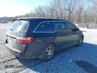 2012 Honda Odyssey EX-L with VIN 5FNRL5H69CB017227, listed as a IAAI auction lot 41345254 with 136,775 mi miles and . Bid and sale history available at carsss.com. Image 4.