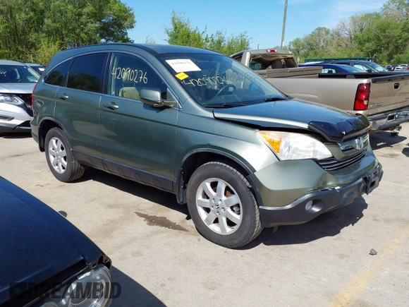 2007 Honda CR-V EX-L z VIN JHLRE387X7C073092, wystawiony jako IAAI lot #42090276 z przebiegiem 150 297 mil mil oraz . Historia ofert i sprzedaży dostępna na DreamBid. Obrazek 1.