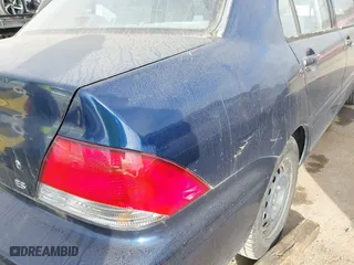 2003 Mitsubishi Lancer ES with VIN JA3AJ26E13U010757, listed as a IAAI auction lot 41450627 with 232,122 mi miles. Bid and sale history available at carsss.com. Image 6.