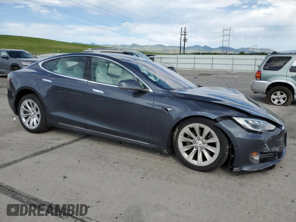 2017 Tesla Model S 100D z VIN 5YJSA1E25HF187898, wystawiony jako Copart lot #60829025 z przebiegiem 82 823 mil mil oraz Szkoda całkowita • Salvage title. Historia ofert i sprzedaży dostępna na DreamBid. Obrazek 4.