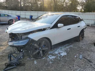 2025 BMW iX xDrive50 with VIN WB523CF0XSCS62033, listed as a Copart auction lot 42503325 with 7,294 mi miles and Salvage Title. Bid and sale history available at carsss.com. Image 1.