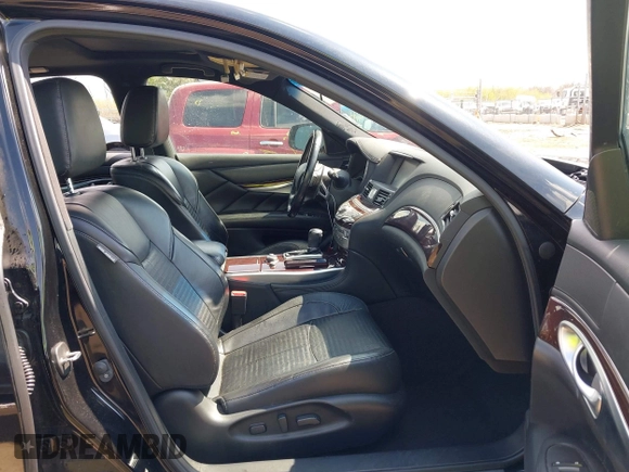 2015 Infiniti Q70 with VIN JN1BY1ARXFM562402, listed as a IAAI auction lot 41910400 with 131,469 mi miles and . Bid and sale history available at DreamBid. Image 5.