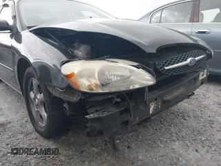 2003 Ford Taurus SES Standard with VIN 1FAFP55223A152802, listed as a IAAI auction lot 42390857 with 141,673 mi miles and . Bid and sale history available at DreamBid. Image 14.