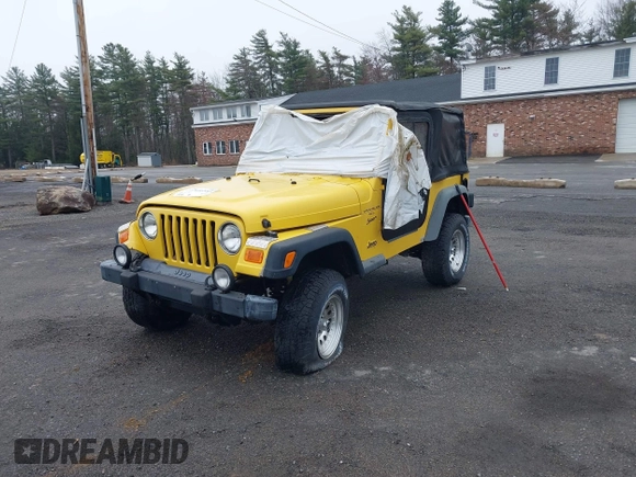 2000 Jeep Wrangler Sport with VIN 1J4FA49S9YP736984, listed as a IAAI auction lot 42055385 with 191,910 mi miles and . Bid and sale history available at DreamBid. Image 2.