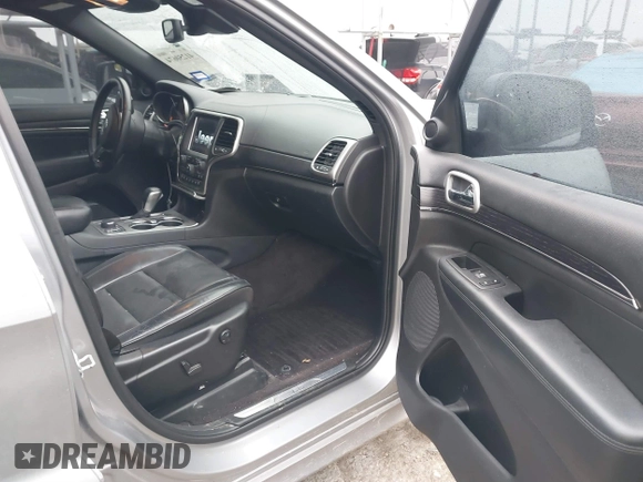 2018 Jeep Grand Cherokee High Altitude with VIN 1C4RJFCG4JC360338, listed as a IAAI auction lot 41250674 with 83,924 mi miles. Bid and sale history available at carsss.com. Image 5.
