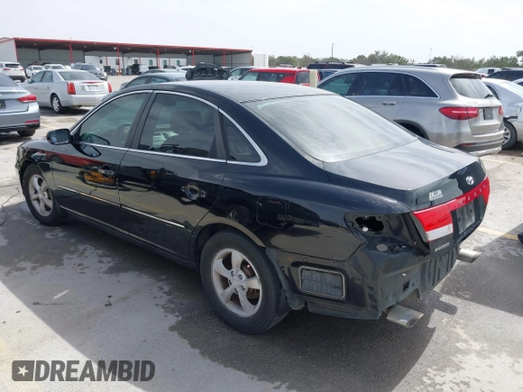 2006 Hyundai Azera SE with VIN KMHFC46F06A113482, listed as a IAAI auction lot 41733834 with 242,159 mi miles and . Bid and sale history available at DreamBid. Image 3.