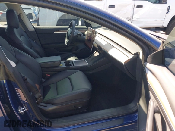 2022 Tesla Model 3 Performance with VIN 5YJ3E1EC5NF315764, listed as a IAAI auction lot 41760552 with 22,354 mi miles and . Bid and sale history available at carsss.com. Image 5.