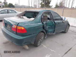 2000 Honda Civic EX z VIN 2HGEJ8642YH529454, wystawiony jako IAAI lot #41782757 z przebiegiem 243 743 mil mil oraz . Historia ofert i sprzedaży dostępna na DreamBid. Obrazek 4.