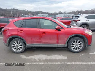 2015 Mazda CX-5 Grand Touring with VIN JM3KE4DY1F0540586, listed as a IAAI auction lot 41710216 with 148,800 mi miles. Bid and sale history available at carsss.com. Image 13.