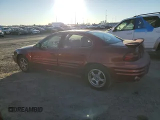 2001 Pontiac Grand Am SE1 with VIN 1G2NF52T91M517918, listed as a Copart auction lot 88164755 with 135,944 mi miles and Salvage Title. Bid and sale history available at carsss.com. Image 2.