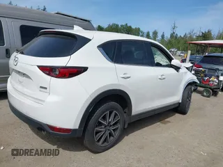 2018 Mazda CX-5 Grand Touring with VIN JM3KFBDM1J0309260, listed as a IAAI auction lot 42247237 with Not Provided miles and . Bid and sale history available at DreamBid. Image 4.