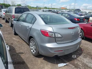 2013 Mazda 3 i SV with VIN JM1BL1TF5D1798081, listed as a IAAI auction lot 42091117 with 137,669 mi miles. Bid and sale history available at carsss.com. Image 3.