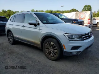 2018 Volkswagen Tiguan SEL z VIN 3VV2B7AXXJM009697, wystawiony jako Copart lot #66335425 z przebiegiem 129 117 mil mil oraz Czysty tytuł • Clean title. Historia ofert i sprzedaży dostępna na DreamBid. Obrazek 4.