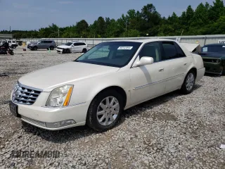 2009 Cadillac DTS 1SC z VIN 1G6KD57Y99U141826, wystawiony jako Copart lot #56242094 z przebiegiem 107 960 mil mil oraz Szkoda całkowita • Salvage title. Historia ofert i sprzedaży dostępna na DreamBid. Obrazek 1.